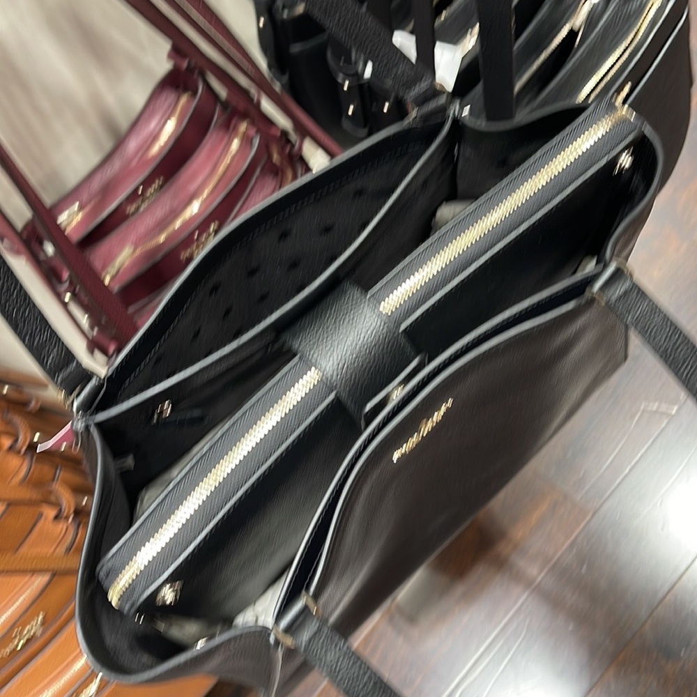 Kate Spade Brim Laptop Tote
COLOR:
Black - Picture 12 of 16